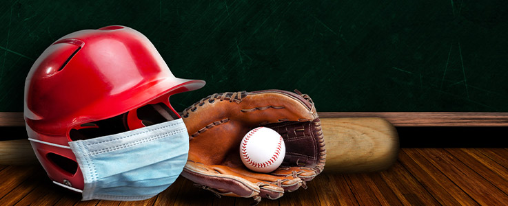 baseball gear with helmet wearing medical mask