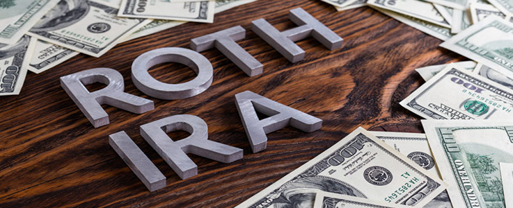 roth ira text surrounded by cash